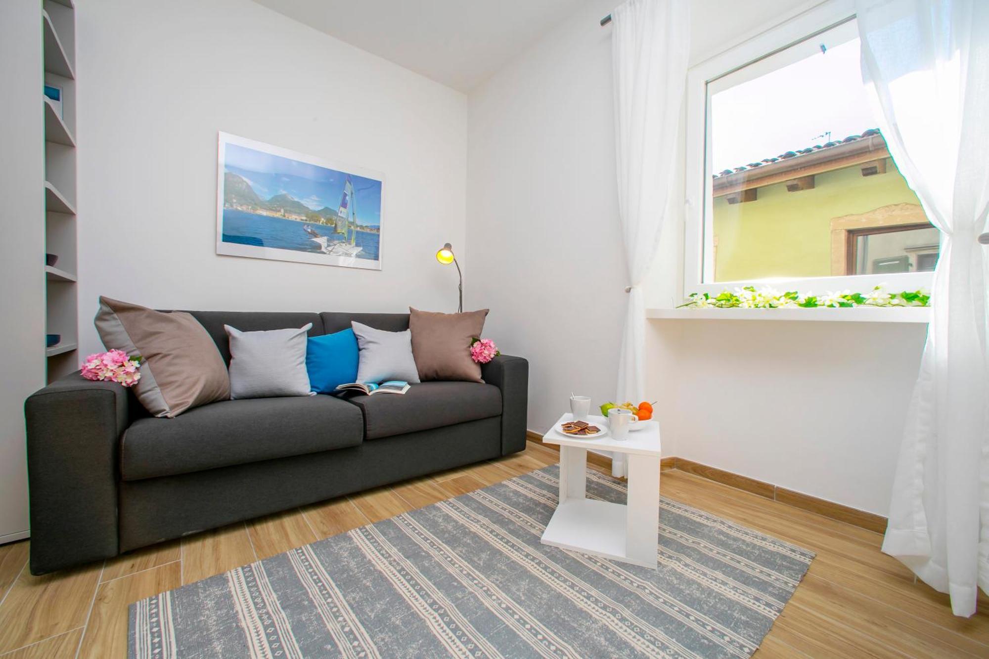 Nido Sui Tetti Di Riva Del Garda - Happy Rentals Экстерьер фото