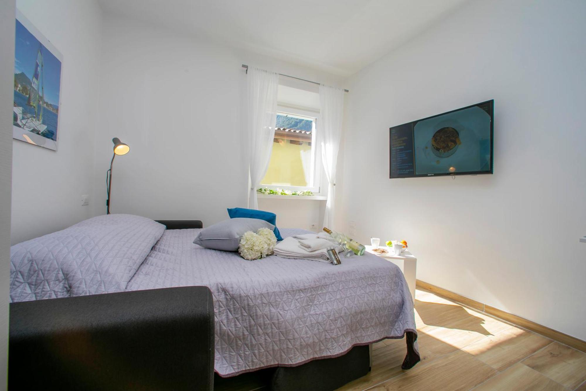 Nido Sui Tetti Di Riva Del Garda - Happy Rentals Экстерьер фото